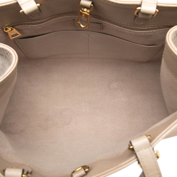 Pre-Loved Louis Vuitton Monogram Empreinte OnTheGo MM - Picture 4 of 7